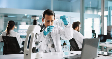Microscope, chemical and scientist with man in laboratory for science sample, molecular reaction...