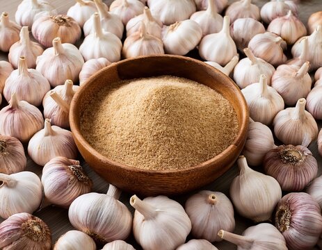 Garlic bulbs and powder displayed in wooden bowl surrounded by fresh cloves