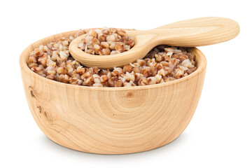 Boiled buckwheat in a wooden bowl isolated on white background
