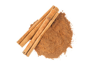 Cinnamon sticks and powder isolated on white background. Top view. Flat lay