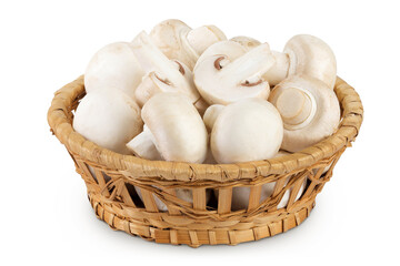 Fresh mushroom champignon in a wicker basket isolated on white background