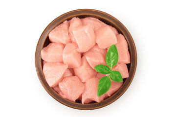 Raw diced chicken fillet in ceramic bowl isolated on white background. Top view. Flat lay