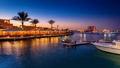 Naklejka premium view of cafe and restaurant in hurghada marina at dusk hurghada red sea governorate egypt north africa africa