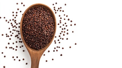 Photo of a pile of raw quinoa seeds, top view.