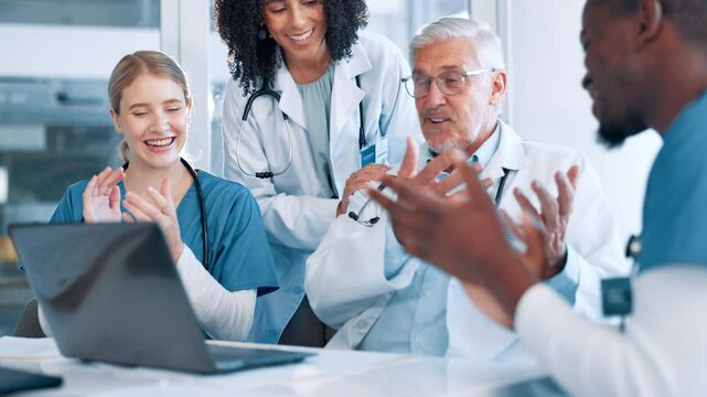 Laptop, nurses and doctors with applause for success in meeting to celebrate healthcare. Medical team, people and clapping hands for hospital report, online results and technology for achievement