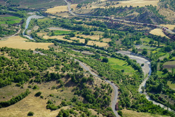 river running through the green valley