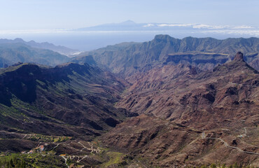 Gran Canaria, landscape of the central part of the island, Las Cumbres, ie The Summits, view from the foot of Roque Nublo towards Roque Bentayga, La Aldea de San Nicolas and Teide on Tenerife
