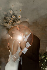 Attractive young couple in love kissing and hugging