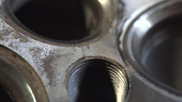 Car service. The cylinder valve and Cylinder head. Damaged cylinder head, worn valves, damaged engine
