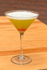 Martini cocktail, Yellow cocktail in a Martini glass, refreshing drink