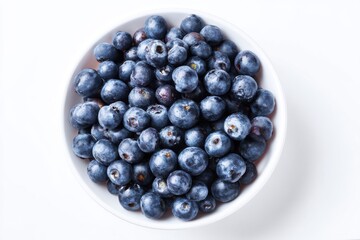 Blueberries in bowl, close up view on white background