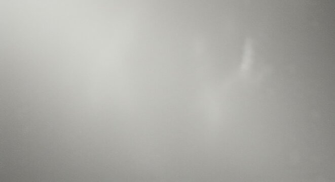 Light Silver Grain Texture Background - Smooth, subtle light silver background with a grainy texture and soft light reflection, symbolizing serenity, elegance, minimalism, purity, and sophistication