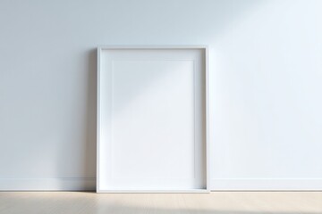 minimalistic empty frame resting against plain white wall surrounded by vast expanse of uncluttered space allowing