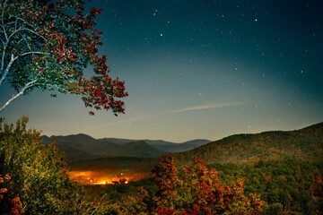 dusk in the mountains with stars