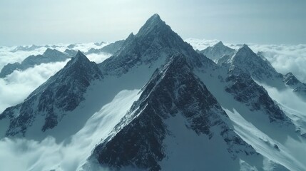 Fototapeta premium Majestic snow-capped peaks pierce the clouds