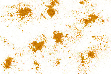 Turmeric powder pile scattered isolated on white background, flying