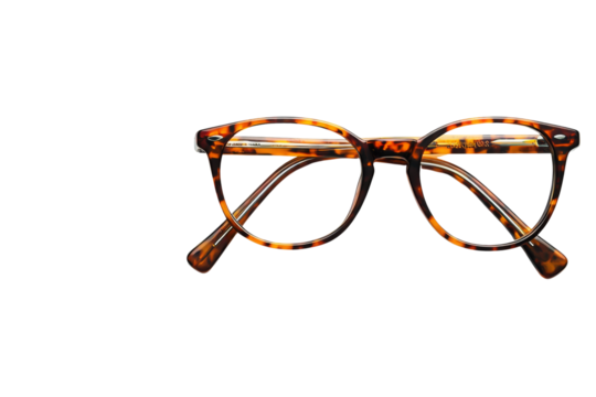 A pair of tortoise shell eyeglasses with round frames are set against a stark black background