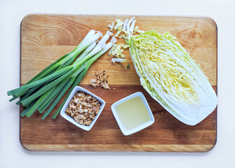 Napa Cabbage Salad Makings on Wood Background