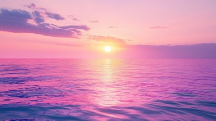 Fototapeta premium Sunset over a tranquil ocean, vibrant hues of pink and purple