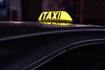 Vienna, Austria: taxi logo on a cab at night