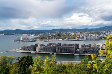 Lively Oslo Cityscape  with Clouds and Harbor Activities in UHD