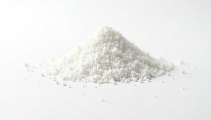 Pile of white granulated sugar on white background, texture, studio, baking