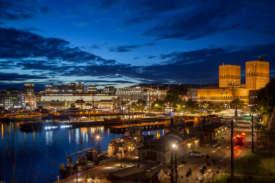 Mesmerizing Oslo Aker Brygge  at Night with Yachts