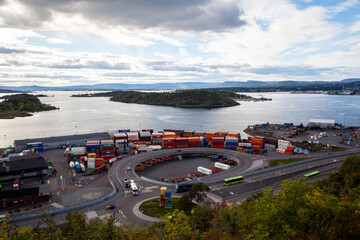Fast-Paced  at Oslo Container Port with Trucks and Cranes in Action