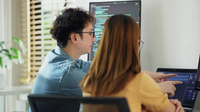 As part of a thriving tech startup, the team of coders meets regularly to discuss project progress, analyze data, and implement applicable solutions, ensuring success in their digital endeavors.