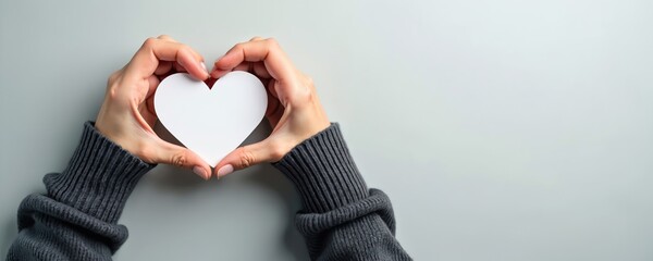 Hands make heart shape. Blank white heart card. Positive feedback for product service. Customer review. Symbol of love, like, social media, charity, health, care, relationships.