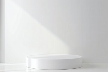 Minimalist White Cylinder Podium with Soft Sunlight Shadow Against a White Wall, Ideal for Product Showcase in a Clean and Modern Studio Setting with Ample Vertical Copy Space
