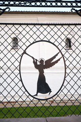 Trumpeting angel in the openwork lattice fence. Tobolsk Kremlin. Tobolsk. Russia