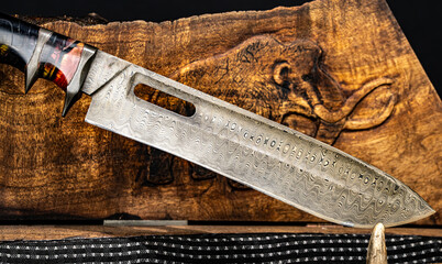 Damascus knives are known for their wavy steel patterns, strength, and sharpness. Made by folding multiple steels, they combine durability with unique, artistic beauty.