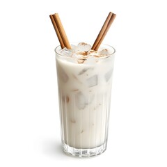 A refreshing Mexican horchata drink in a tall glass, filled with ice, with a cinnamon stick garnish, isolated on a bright white background.