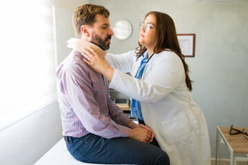 Medical professional fitting neck brace on whiplash patient during clinical examination, providing...