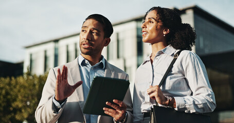 Business, people and talk with tablet in city for planning, engineer team and urban development. Man, woman or discussion with digital for information, project management and infrastructure expansion