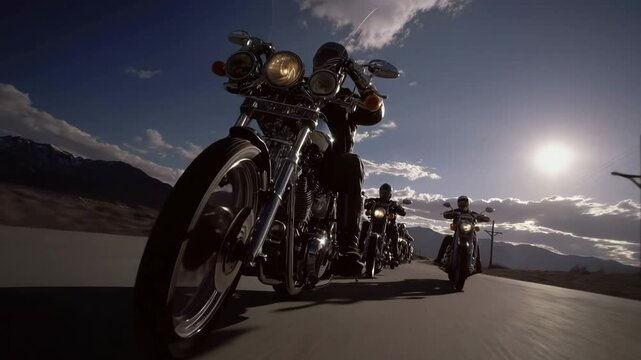 A bunch of motorcycle riders on cruiser-choppers on the road.