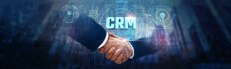CRM (Customer Relationship Management): Businessman handshake on digital interface and synchronized...