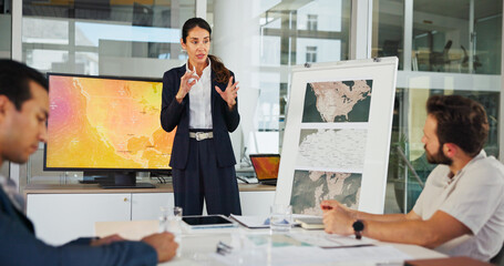 Business woman, screen or renewable energy with map for presentation on world development at office. Female person, employee or speaker with technology display, ideas or global project at workplace