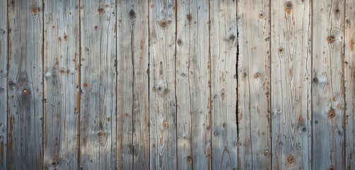 A rustic wooden wall featuring a variety of textured wood planks, showcasing natural grains and knots, with warm tones of brown and hints of weathered gray for added character.