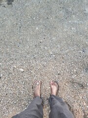 Feet on White Sand, Relaxing Moment by the Tropical Shore