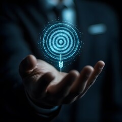 Fototapeta premium Strategic planning concept showing businessman hand with floating bullseye target icon, symbolizing business focus, marketing success, and objective alignment 