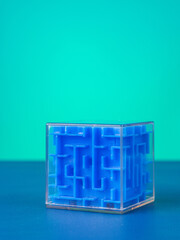 Close-up of a volumetric blue  cube maze on a blue background