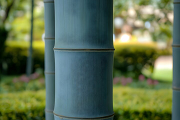 Naklejka premium Serene Teal Bamboo Stalks in a Tranquil Garden Setting