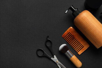 Set of male shaving accessories on black background