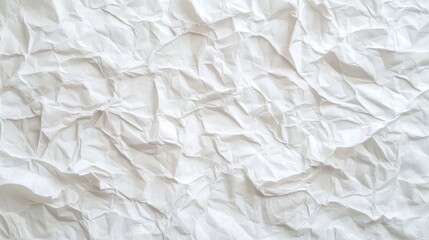 Obraz premium A close-up view of crumpled white paper texture.