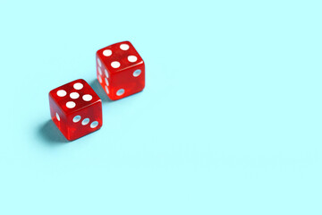 Red game dices on blue background