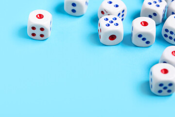 Dices with red and blue pips on blue background