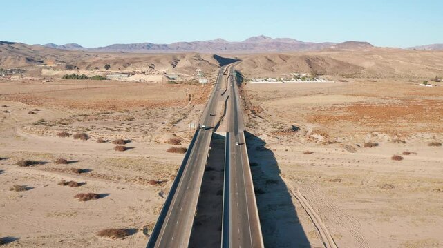 Aerial drone shot view of 15 Highway near Barstow California car traffic desert
