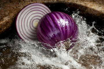 Vibrant Red Onion in Water Splash: Culinary Photography